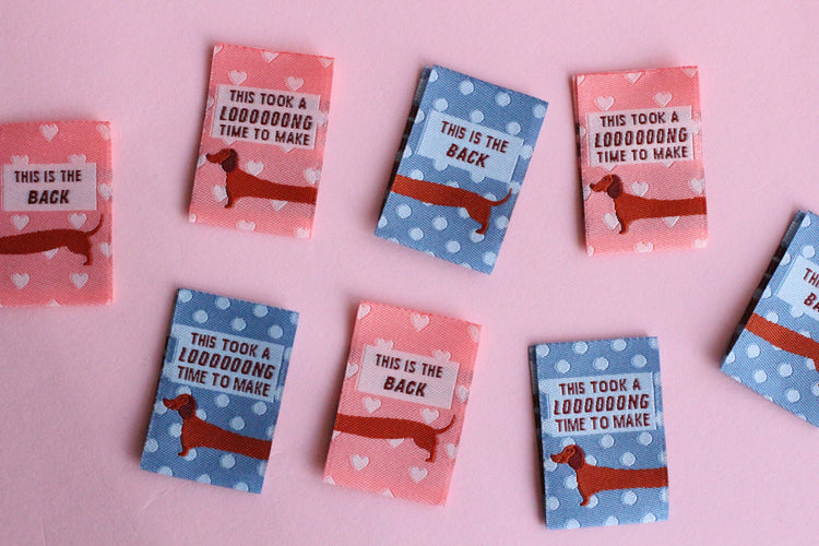 The Cosy Club Handmade Sew In Labels - Pink and Blue Sausage Dog